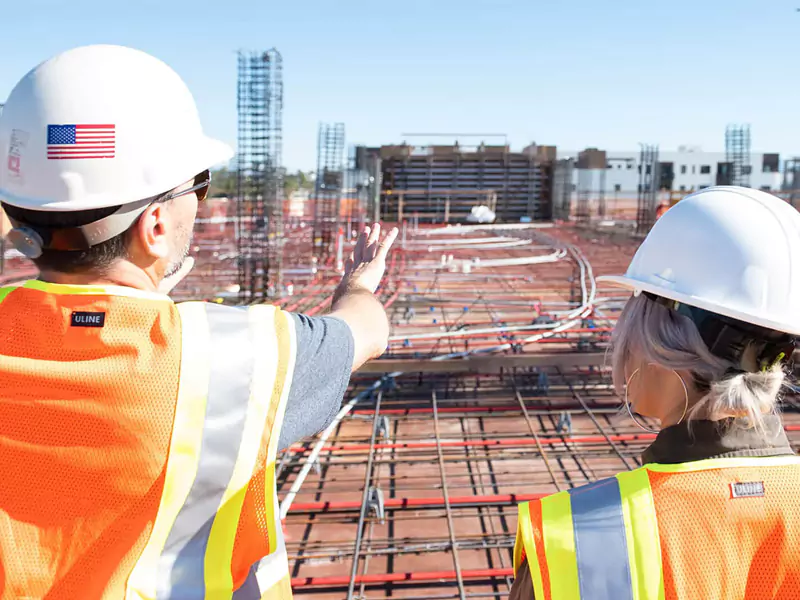 Workers looking over construction project